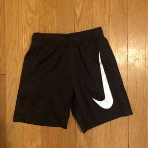 Nike athletic shorts kids size 5 / small giant swoosh